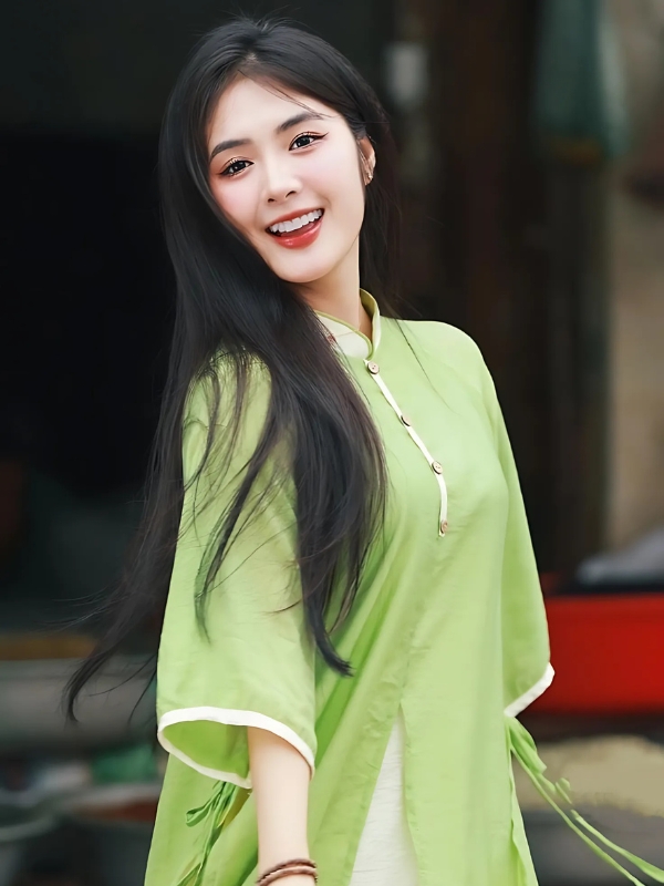 Gái xinh mặc áo dài xanh ngọc nhẹ nhàng