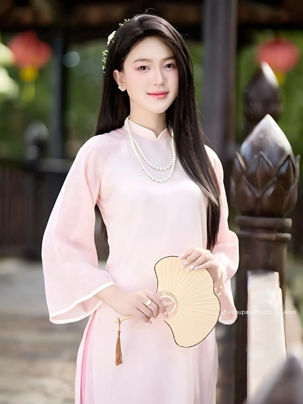 Gái xinh mặc áo dài hồng dịu dàng
