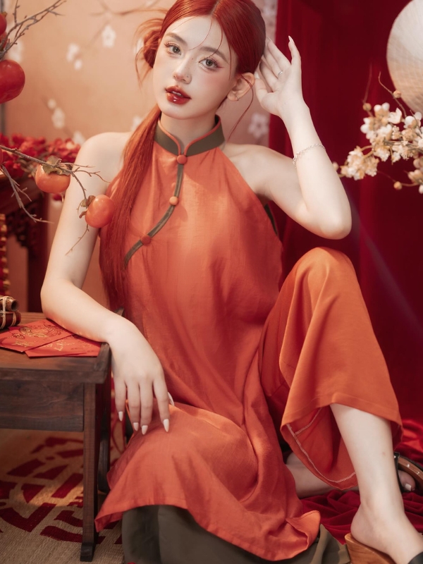 Vẻ đẹp quý phái với đầm cam nổi bật